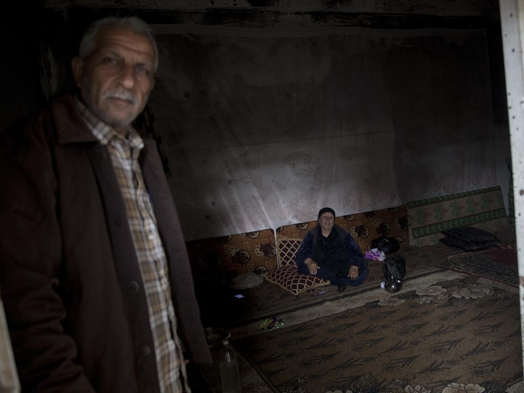 This couple returned to live in their home in Deir ez Zor even thought it is destroyed. Picture: Ella Pellegrini