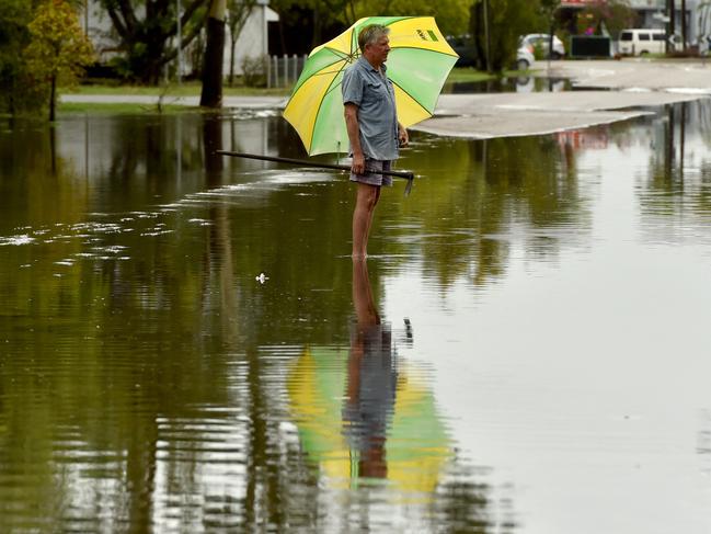 Wet weather in Townsville. Gulliver resident Frederick Buck in Strange Street. Picture: Evan Morgan