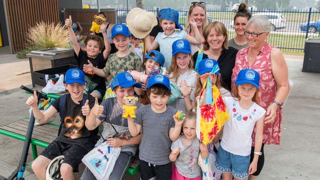 Teachers and kids from Clifton Creek Primary School excitedly open donations sent from all over the world. Picture: Jason Edwards