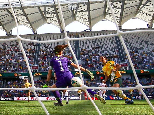 Chile's goalkeeper Christian Endler (left) fails to stop a goal from Sam Kerr of the Matildas during the Womens International Friendlies soccer match between the Matildas and Chile at Bankwest Stadium in Sydney, Saturday, November 9, 2019. (AAP Image/David Gray) NO ARCHIVING, EDITORIAL USE ONLY