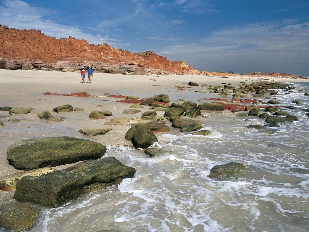 A five-year-old boy has been rescued after a man drove his four-wheel drive into the ocean off Dampier foreshore in the Pilbara region of Western Australia.