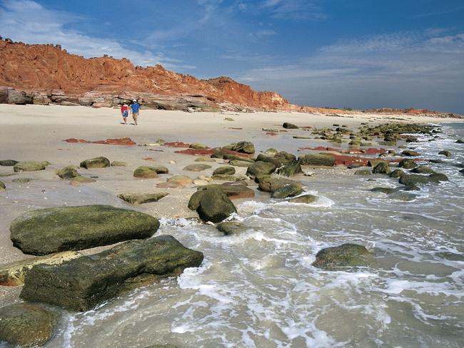 A five-year-old boy has been rescued after a man drove his four-wheel drive into the ocean off Dampier foreshore in the Pilbara region of Western Australia.