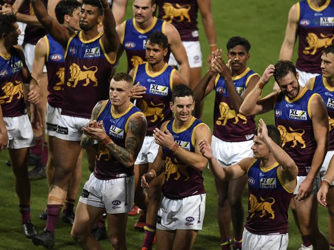 The Lions applaud their fans in their first game back in Cairns for 15 years.