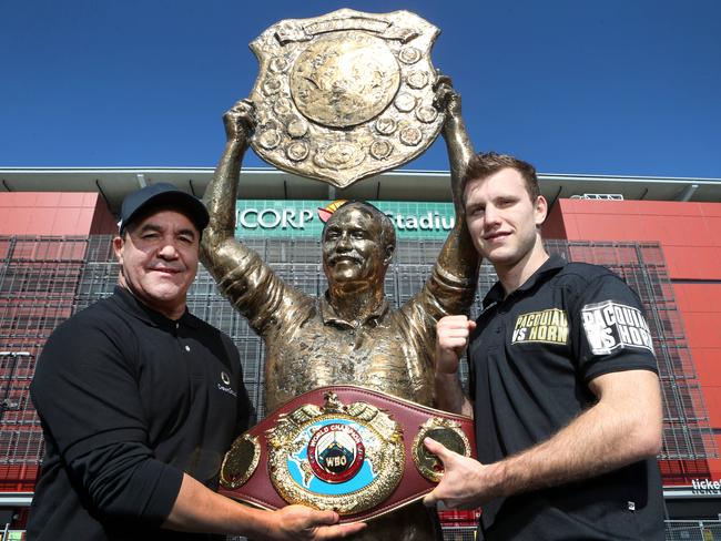 Jeff Fenech and Jeff Horn at the Wally Lewis statue outside Suncorp Stadium. Picture: Darren England.