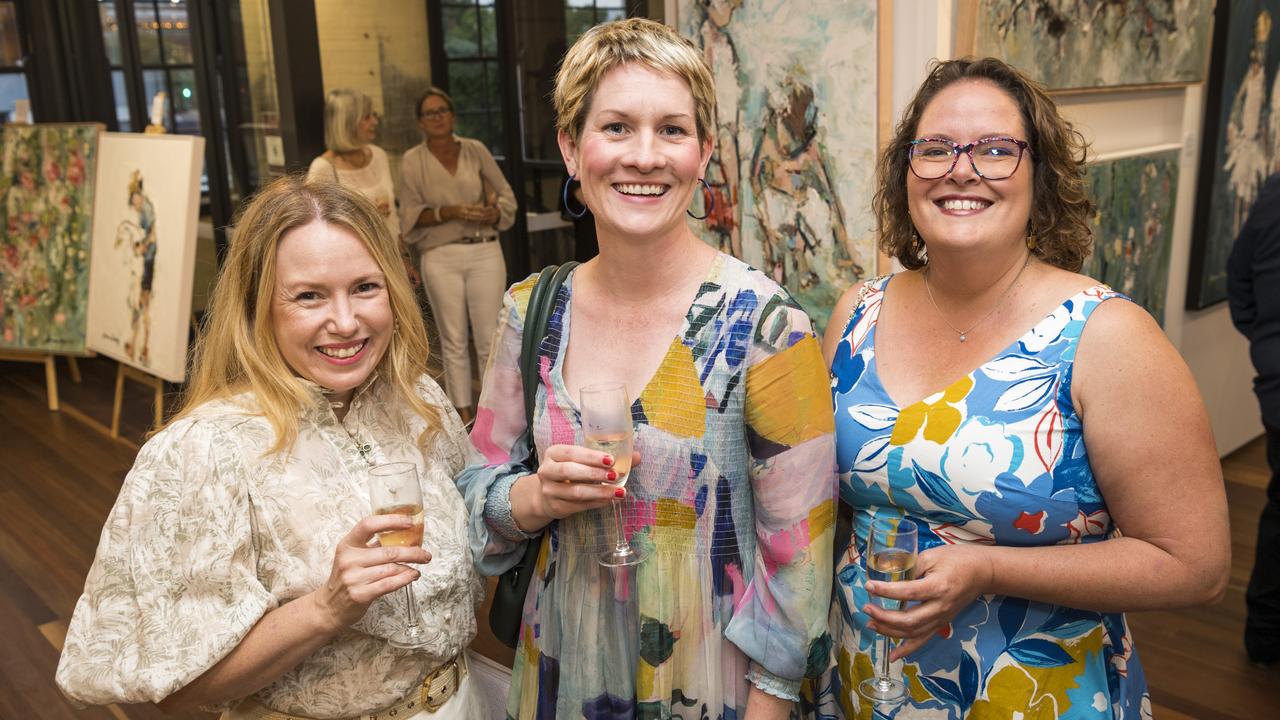 At the opening of Unbridled by Joanna Davies are (from left) Chrissy Stankiewicz, Zoe O'Sullivan and Claire Howden at The Toowoomba Gallery, Thursday, October 21, 2021. Picture: Kevin Farmer