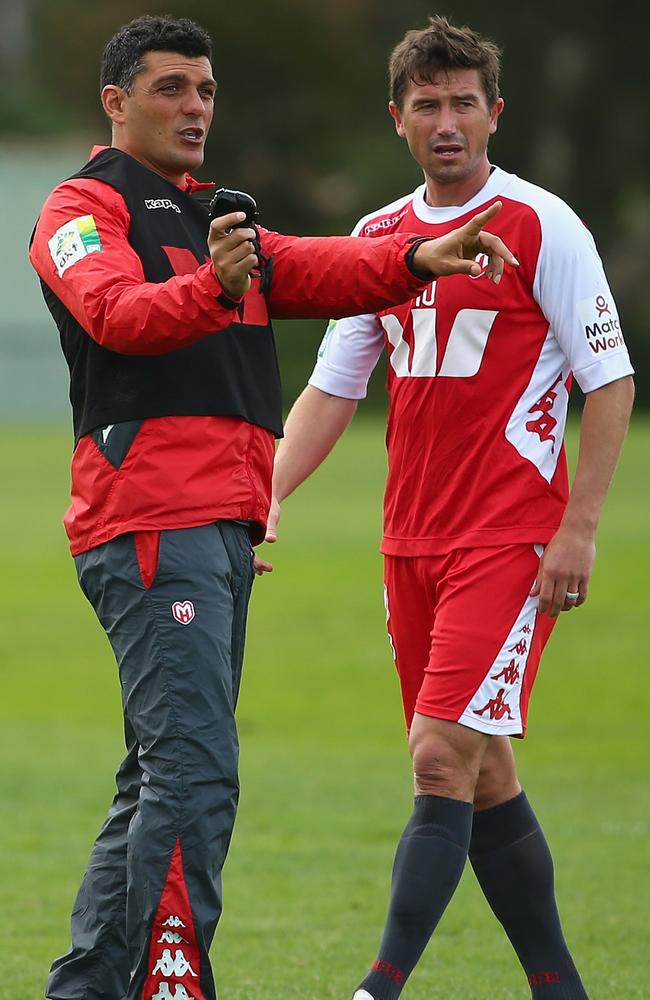 John Aloisi, as coach of Melbourne Heart in 2013, talks with Harry Kewell during training. Picture: Robert Cianflone/Getty Images