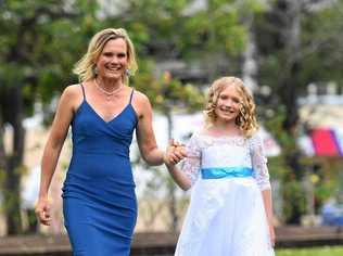 Annika Dean, here with mother Kylie, is a finalist for Queensland's Community Achievement awards. Picture: Troy Jegers