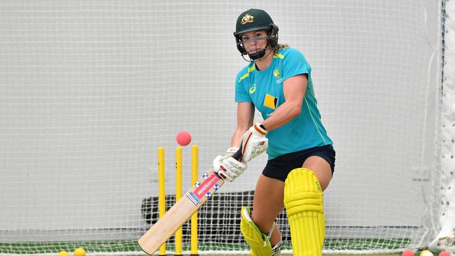 Swimmer Emily Seebohm batting this morning at the National Cricket Centre.             (AAP Image/Darren England) 