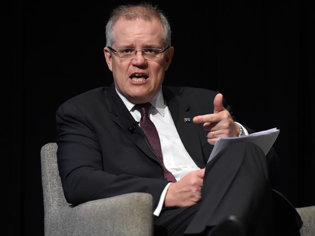 Treasurer Scott Morrison takes questions after delivering the keynote address at The Tax Institute breakfast in Sydney this morning. Picture: AAP Image/Dean Lewins