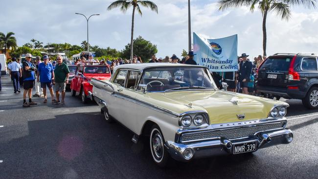 Vintage cars at the Airlie Beach Anzac Day march. Photo: Zoe Devenport