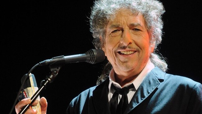 Once an outsider, Bob Dylan accepts his Nobel prize for literature.