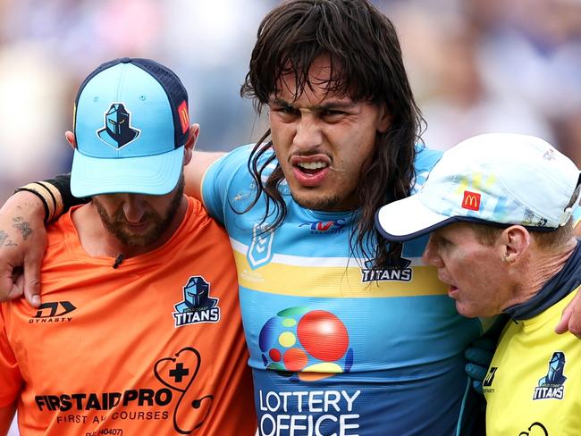 SYDNEY, AUSTRALIA - MARCH 23: Tino Fa'asuamaleaui of the Titans is helped from the field during the round three NRL match between Canterbury Bulldogs and Gold Coast Titans at Belmore Sports Ground, on March 23, 2024, in Sydney, Australia. (Photo by Brendon Thorne/Getty Images)