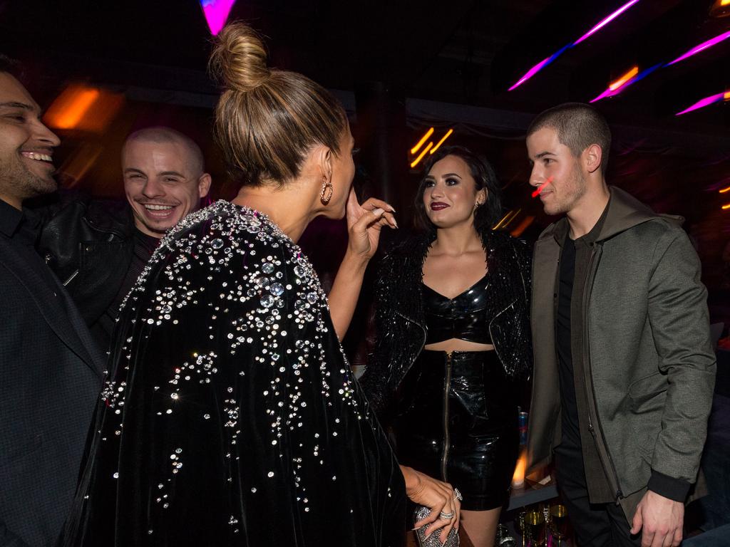 Jennifer Lopez ,Demi Lovato and Nick Jonas attend Jennifer Lopez’s 2015 American Music Awards After Party on November 22, 2015 in Los Angeles, California. Picture: Getty