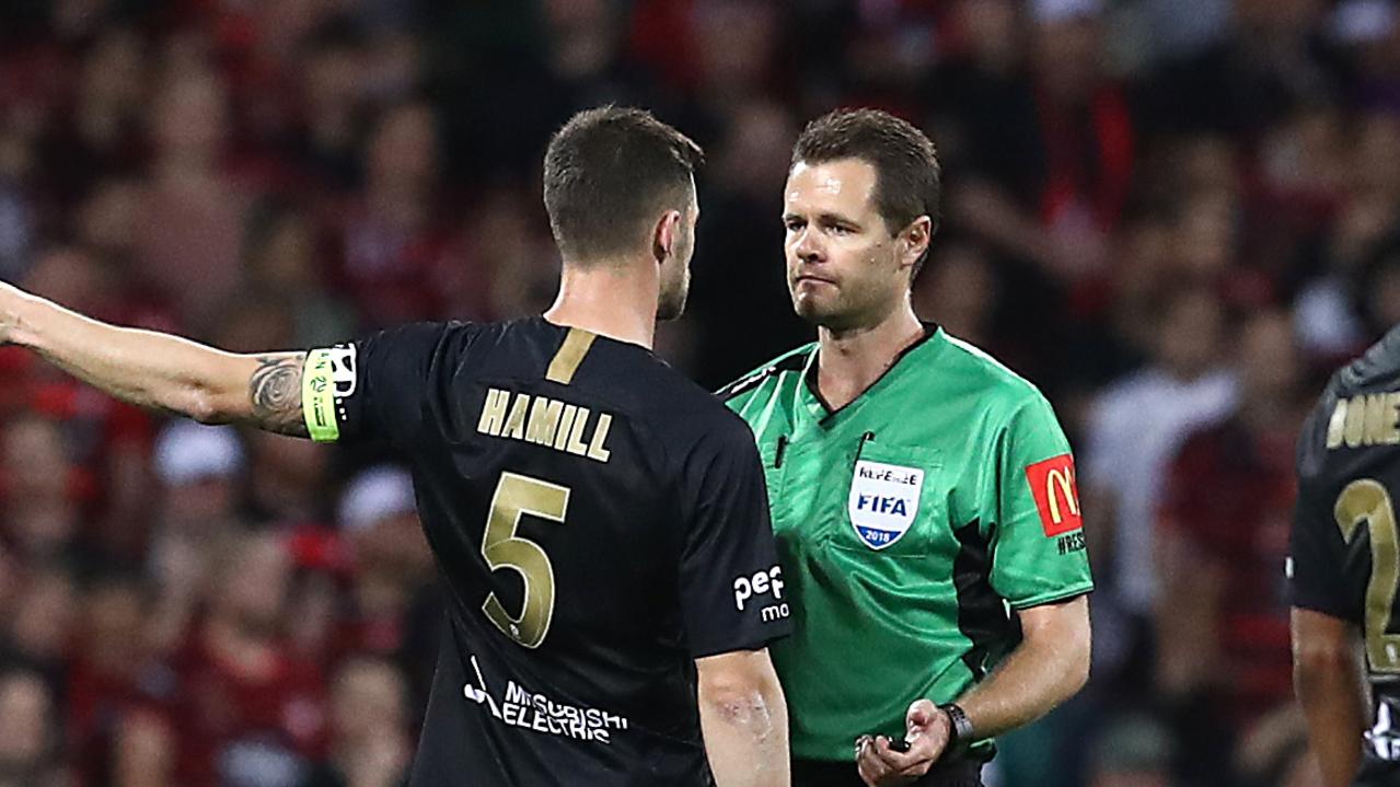 Brendan Hamill of the Wanderers speaks with Referee Chris Beath