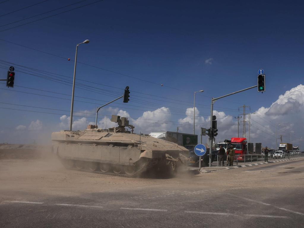 The traffic is stopped as Israeli armoured vehicles advances towards the border with the Gaza Strip. Picture: AFP