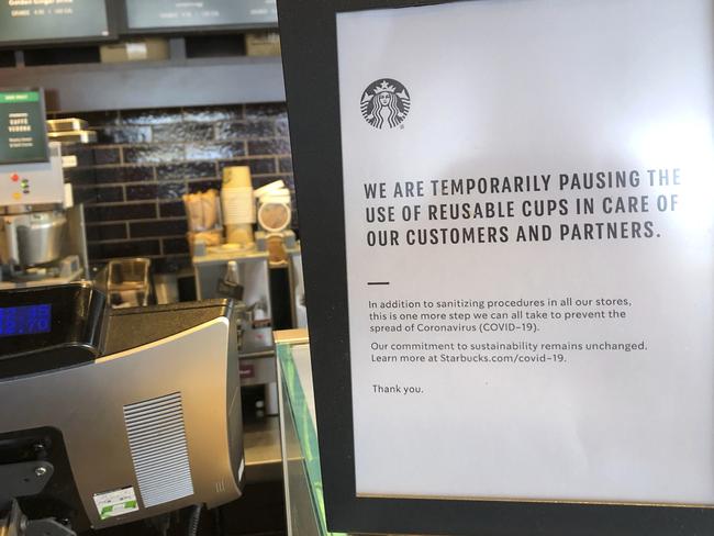 A sign posted at a Starbucks store in Tacoma, Washington. Reusable cups are also being banned across Europe. Picture: AP Photo/Ted S. Warren