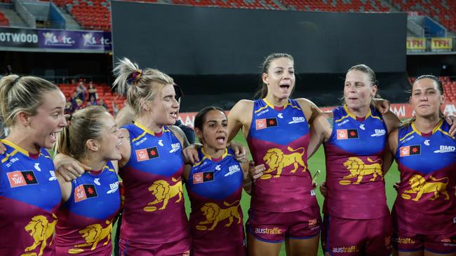 Brisbane sings the song after storming into AFLW finals with a commanding win.