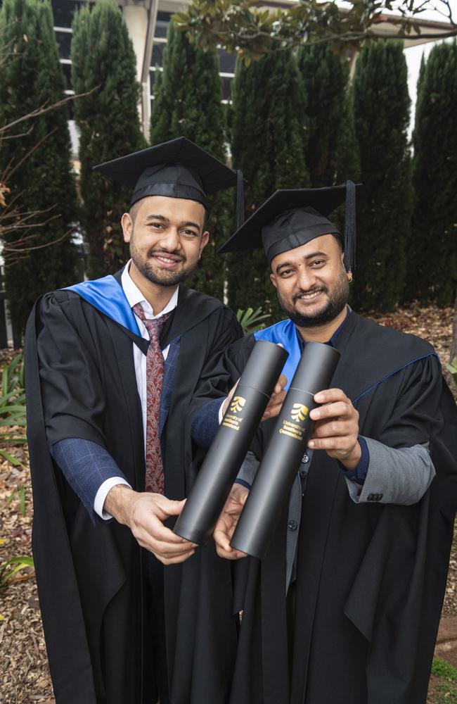 Bishal Bhandari (left) and Kamal Timsina celebrate graduating together with a Master of Science (Agricultural Science) at a UniSQ graduation ceremony at The Empire, Tuesday, June 25, 2024. Picture: Kevin Farmer