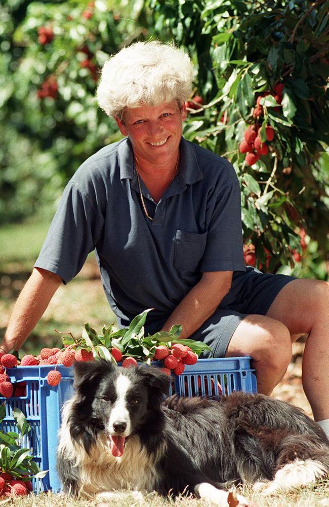 Bundaberg Lychee grower Glenice Purdey, dubbed the Lychee Lady, with her dog Megsie in 1997.