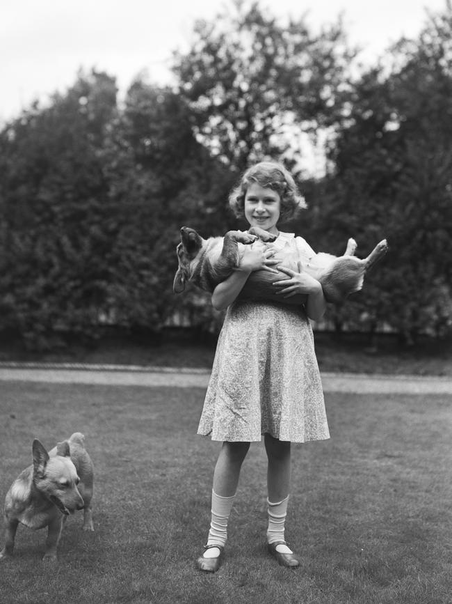 Princess Elizabeth with corgis Dookie and Jane in 1936. Picture: Lisa Sheridan/Studio Lisa/Hulton Archive/Getty Images