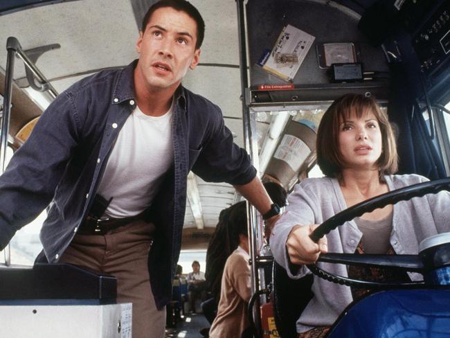 Keanu Reeves and Sandra Bullock in Speed are Pratt and Howard’s action couple prototype for Jurassic World. Picture: Supplied