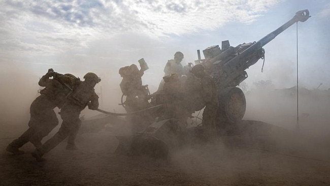 Gunners from the 8th/12th Regiment, Royal Australian Artillery fire 155mm rounds from the M777 howitzer as part of Exercise Predator’s Run 2024, in Mt Bundey, NT. Picture: Department of Defence