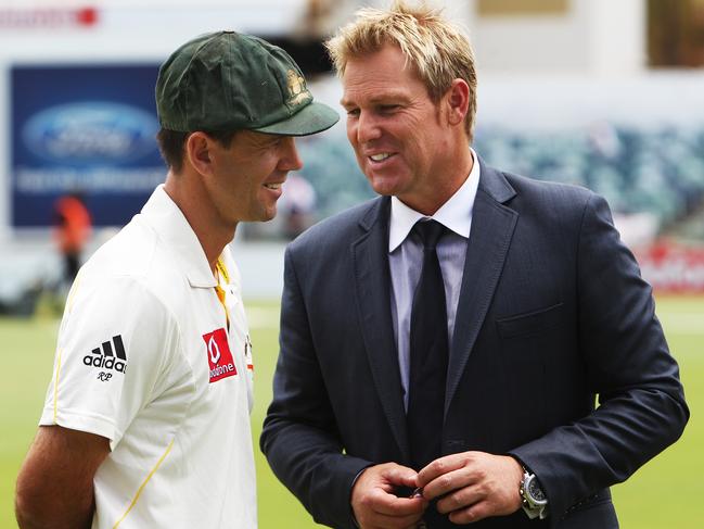 Ricky Ponting (L) talks to Shane Warne at the WACA ground in Perth, Western Australia.