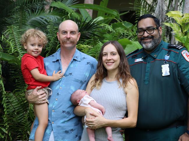 Luke and Sinead Featonby, with son Jimmy and baby Dawn, reunite with St John NT dispatcher Kenneth Viegas. Picture: Supplied