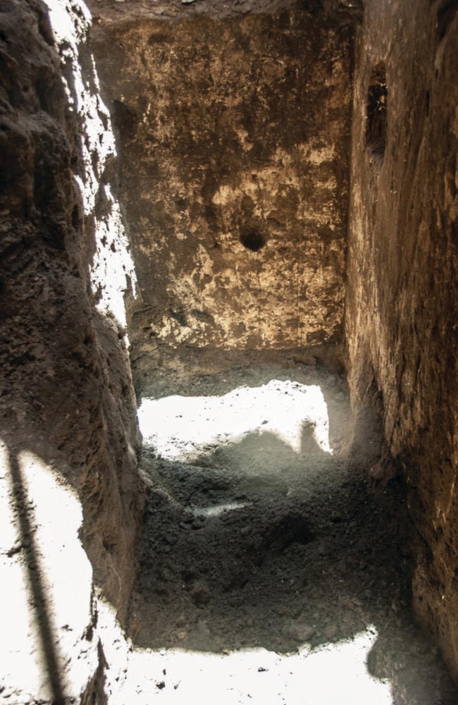 Into the pit ... The sight that greeted workers and archaeologists, after the rubble and sewage system was removed. Picture: Luxor Times.