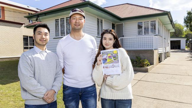 Successful bidders Jason Kwan, Bill Mo and Peilin Li at auction of 53 Kuring Gai Avenue, Tarragindi by Ray White Mt Gravatt, Saturday, August 3, 2024 - Picture: Richard Walker