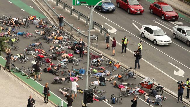 Police directed traffic during the ten minute protest outside the Lady Cilento Children’s Hospital. Picture: Liam Kidston