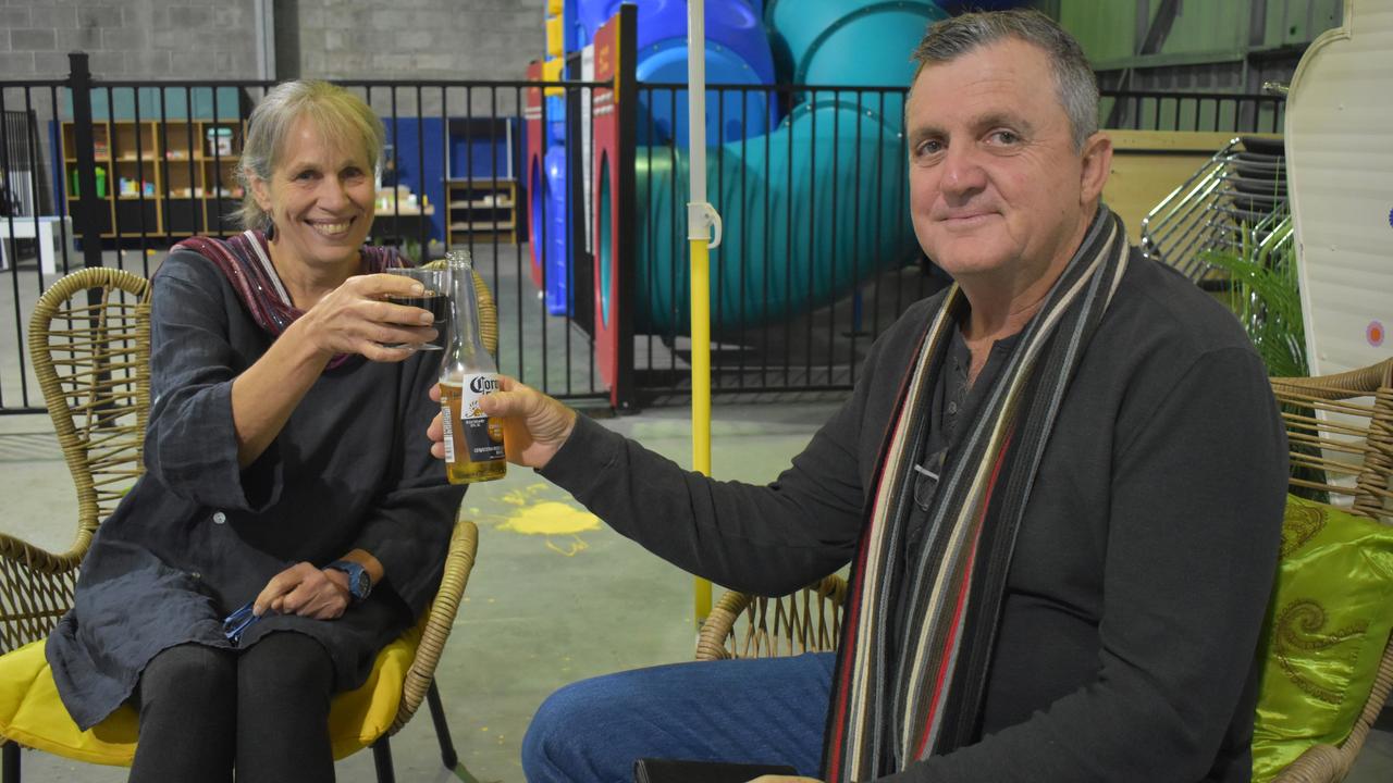 Peter Worth and Marion Kerwitz enjoy drinks at the opening of the Neighbourhood Hive in Hervey Bay.