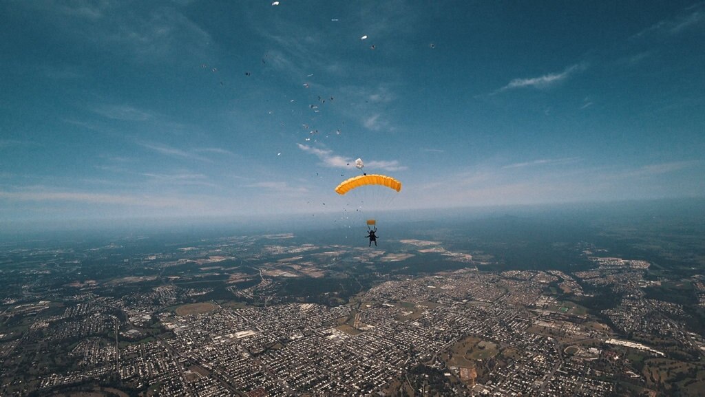 Brisbane radio host Stav Davidson dropped $10,000 in $5 notes during a skydive. Picture: Contributed