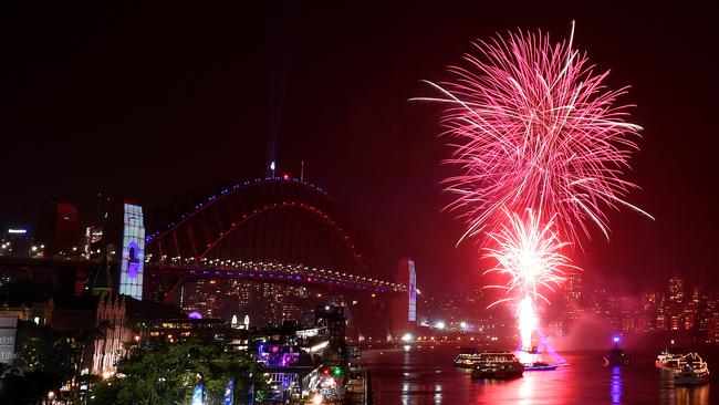 The family fireworks explode over the Sydney Opera House and Sydney Harbour Bridge. Picture: AAP