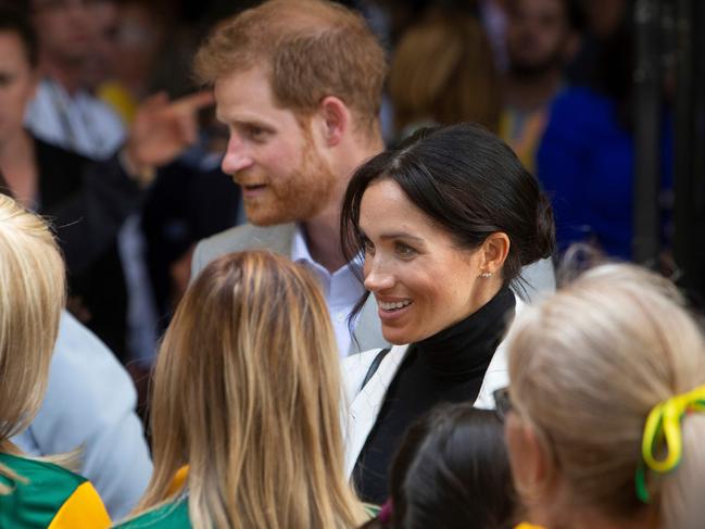 Britain's Prince Harry and his wife Meghan attend a lunchtime reception hosted by the Prime Minister. Picture: AFP