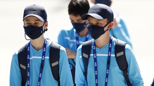 Ball kids arrive at Melbourne Park.