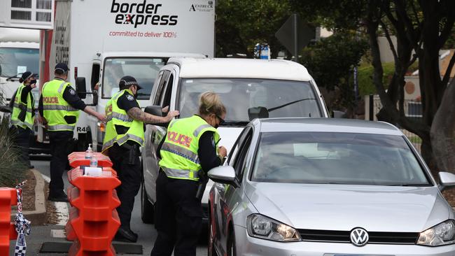 Police check vehicles travelling over the Queensland-New South Wales border at Coolangatta. Picture: Glenn Hampson