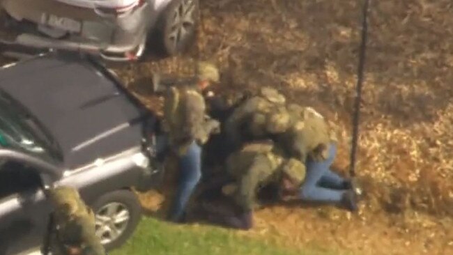The driver flung himself from the car and on the ground before being arrested.