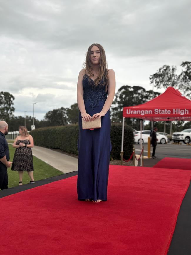 The students of Urangan State High School arriving at their formal.