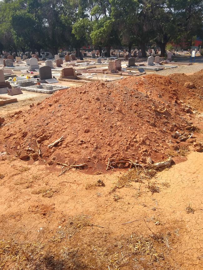 Dirt lies piled up at North Brighton Cemetery.