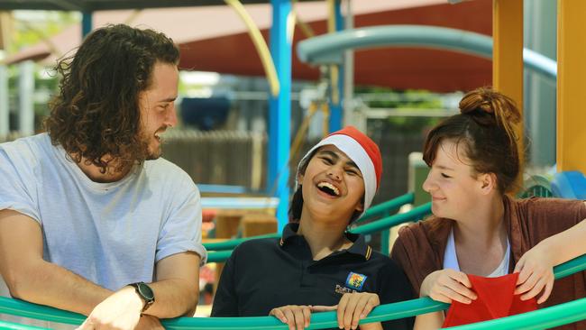 Port Melbourne's huge Christmas street festival returned, with The Voice finalist Jackson Thomas singing with choristers from Port Melbourne Specialist School, including Veronica, 13, and Taylor, 18. Picture: Janine Eastgate