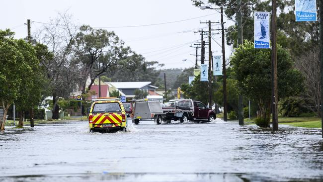 Streets were still under water at Sussex Inlet on Tuesday. Picture: Darren Leigh Roberts