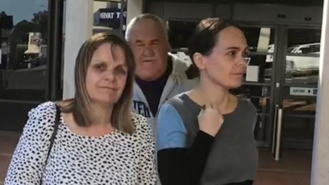 Kimberley Treacy (right) leaves Campbelltown Courthouse with her parents in July.