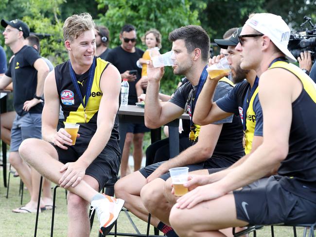 Tom Lynch and Trent Cotchin having a beer. Picture: Sarah Reed