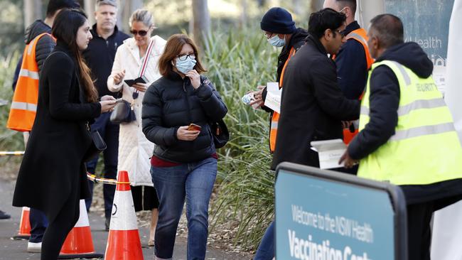 People arriving for their COVID-19 vaccination at the Sydney Olympic Park NSW Health vaccination centre on June 9, 2021. Yesterday the lines for Pfizer were around 5,000 but AstraZeneca was only about 160. People over 50 are find ways around it to get the Pfizer vaccination. Picture: Jonathan Ng