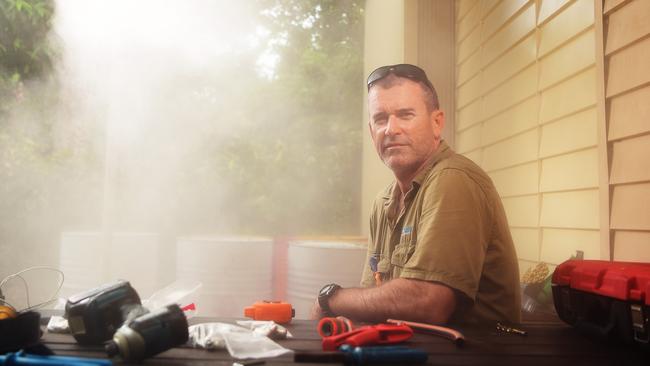 OzMistNT co-owner Luke Hoolihan, is used to working in the Darwin heat, but wouldn't mind starting earlier if it meant he could avoid the humidity. Picture: Justin Kennedy