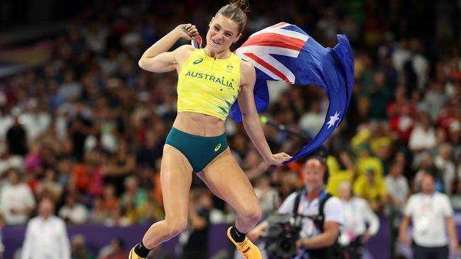 Nina Kennedy celebrates winning the pole vault gold medal. Picture: Getty Images