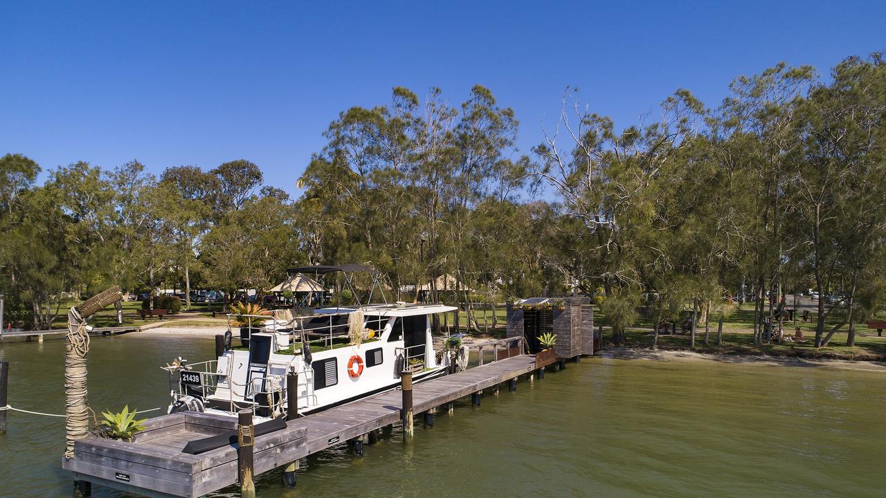 The new owners of this Noosa River jetty and houseboat will enjoy waking up on the waterfront to the remarkable sunrises. Picture: Jason Smith Photography.