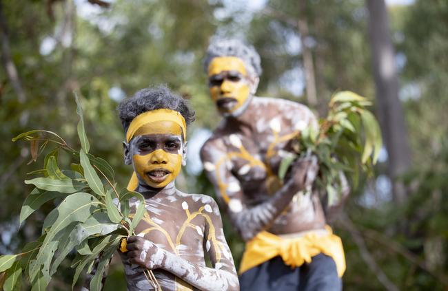 Members of the Gumatj clan prepare for bunggul (traditional dance) at Garma. Picture: AAP Image/Supplied by Yothu Yindi Foundation, Peter Eve