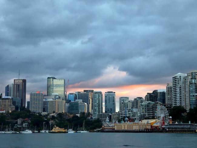 SYDNEY, AUSTRALIA - NewsWire Photos AUGUST 3, 2021: Rain clouds pictured as the sun rises in North Sydney during Lockdown. Picture: NCA NewsWire / Damian Shaw